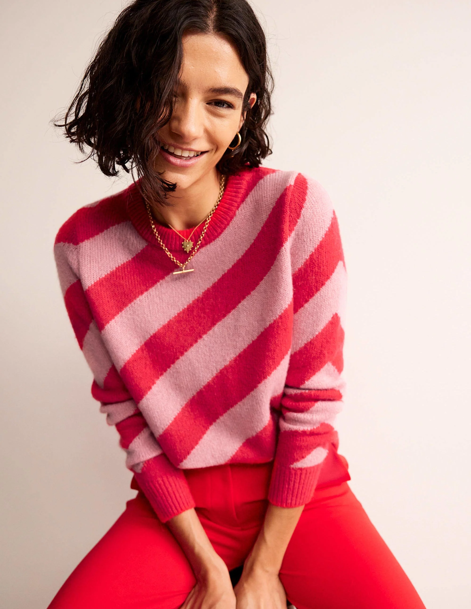 Flauschiger Pullover mit diagonalen Streifen-Orange/Pink gestreift
