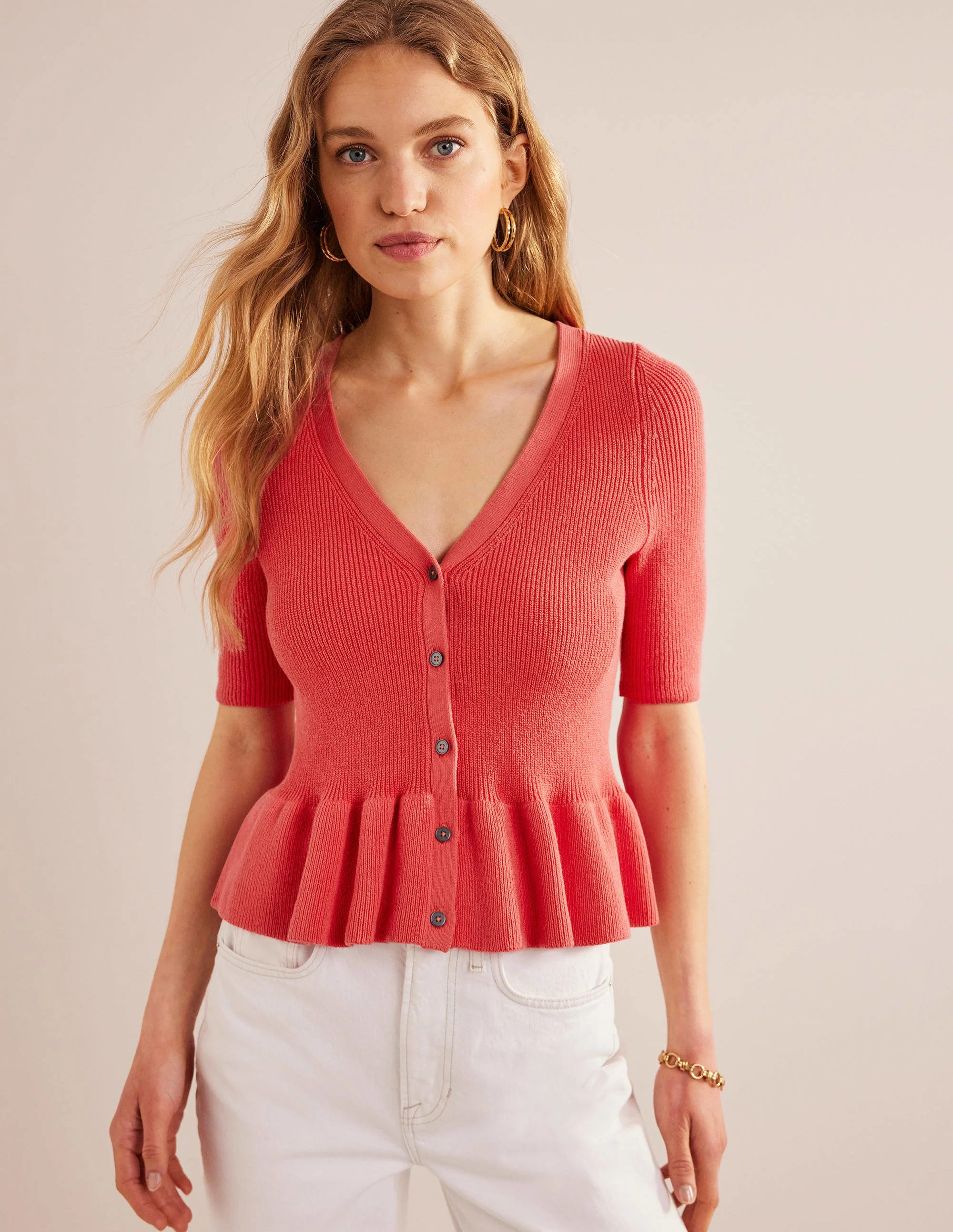 Gerippter Cardigan mit Schößchen-Korallenrosa